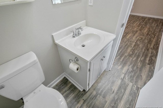 2304 Electra Rd, Fayetteville, NC 28304 - half bathroom with vanity and wood finished floors