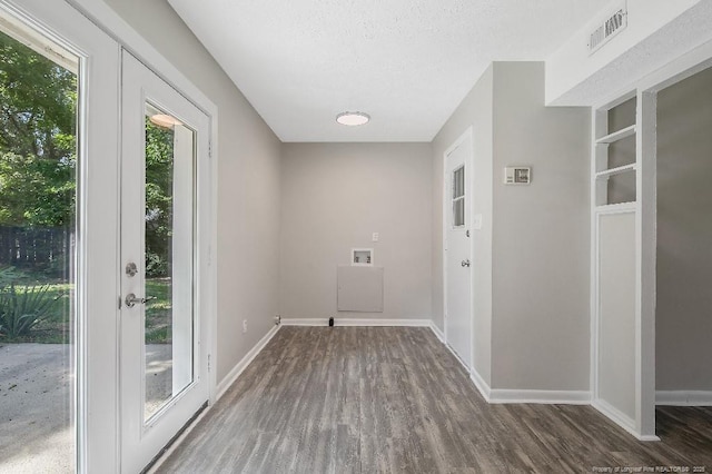 2304 Electra Rd, Fayetteville, NC 28304 - laundry room with wood finished floors, a textured ceiling, and washer hookup
