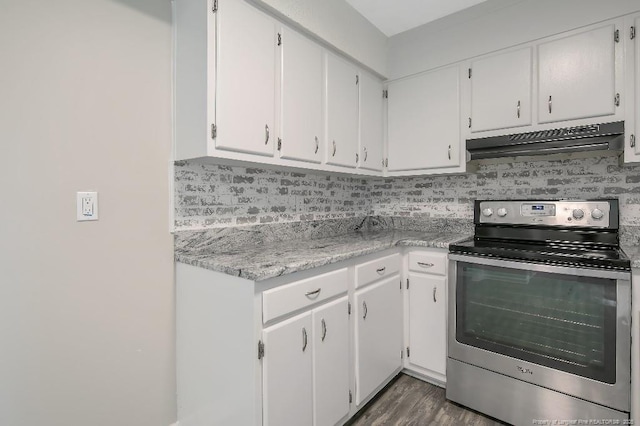 2304 Electra Rd, Fayetteville, NC 28304 - kitchen featuring stainless steel electric range, extractor fan, backsplash, and white cabinets