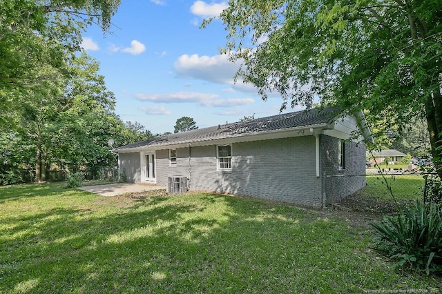 2304 Electra Rd, Fayetteville, NC 28304 - back of house with a patio and brick siding