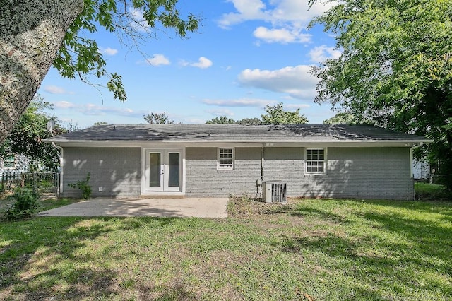2304 Electra Rd, Fayetteville, NC 28304 - back of property featuring french doors, a patio, and brick siding