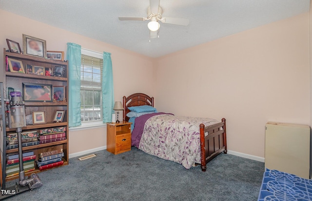 6408 Glen Brack Ct, Raleigh, NC 27603 - carpeted bedroom with baseboards and ceiling fan