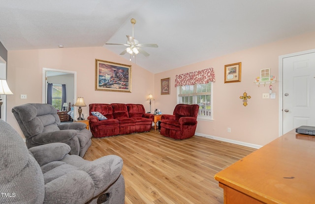 6408 Glen Brack Ct, Raleigh, NC 27603 - living room featuring a ceiling fan, light wood finished floors, and vaulted ceiling