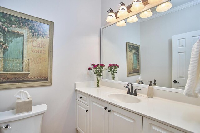 5328 Willow Cry Ln, Raleigh, NC 27613 - bathroom featuring vanity and ornamental molding