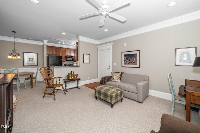 734 Portstewart Dr, Cary, NC 27519 - living room with crown molding, a chandelier, recessed lighting, a ceiling fan, and light colored carpet