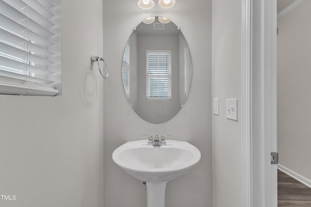 6549 Tremolo Trl, Raleigh, NC 27616 - bathroom with wood finished floors and baseboards