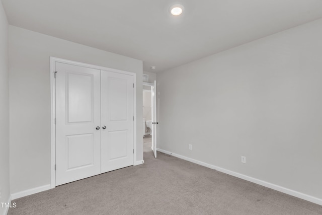 6549 Tremolo Trl, Raleigh, NC 27616 - unfurnished bedroom featuring carpet flooring and a closet