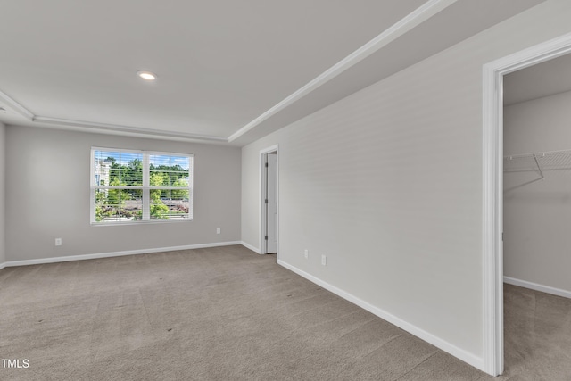 6549 Tremolo Trl, Raleigh, NC 27616 - unfurnished bedroom featuring a walk in closet, carpet floors, and a closet