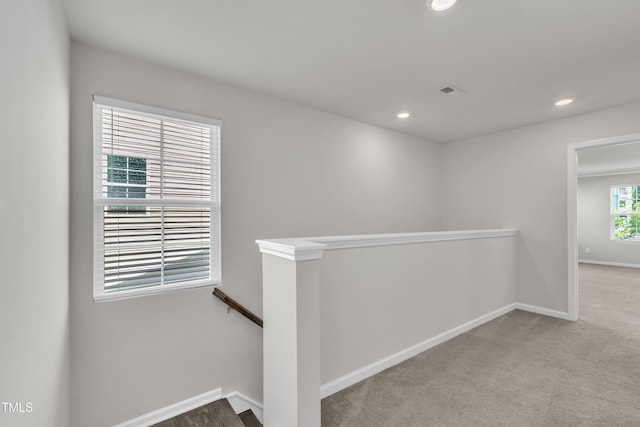 6549 Tremolo Trl, Raleigh, NC 27616 - hall with an upstairs landing, recessed lighting, and carpet flooring