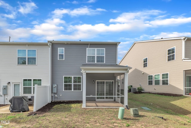 6549 Tremolo Trl, Raleigh, NC 27616 - rear view of property featuring a sunroom and a yard