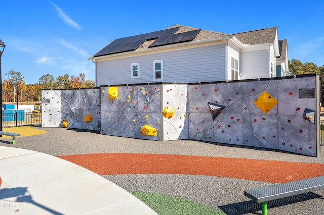 502 Yeowell Dr, Chapel Hill, NC 27514 - view of side of property featuring solar panels and a shingled roof