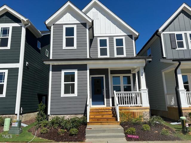 502 Yeowell Dr, Chapel Hill, NC 27514 - craftsman-style house featuring a porch and board and batten siding