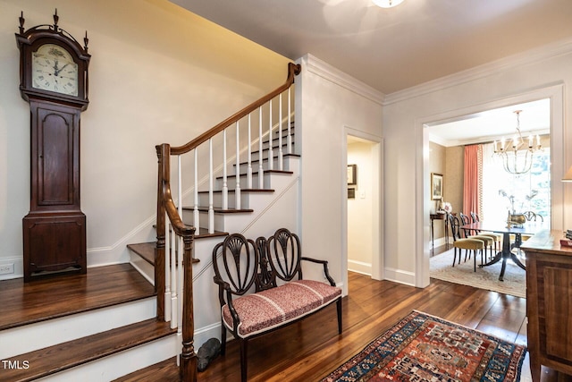 815 Marlowe Rd Unit 10, Raleigh, NC 27609 - entrance foyer with dark wood-style flooring, stairs, a chandelier, and ornamental molding