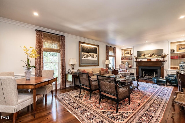 815 Marlowe Rd Unit 10, Raleigh, NC 27609 - living room with ornamental molding, dark wood-type flooring, a fireplace, recessed lighting, and built in features