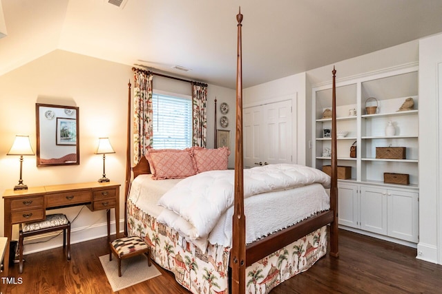 815 Marlowe Rd Unit 10, Raleigh, NC 27609 - bedroom with dark wood-style flooring and lofted ceiling