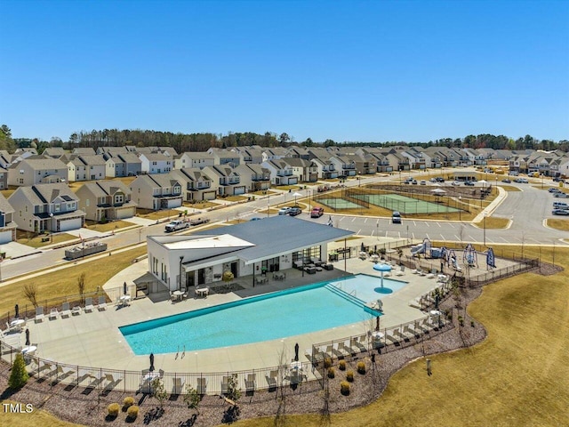 503 Hipwood Dr, Zebulon, NC 27597 - community pool featuring a residential view and a patio area