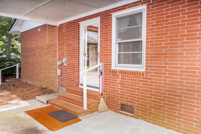 452 N Main St, Wendell, NC 27591 - property entrance featuring crawl space and brick siding