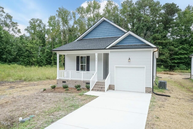 510 Branch St, Rocky Mount, NC 27801 - view of front of property featuring covered porch, a shingled roof, concrete driveway, and a garage