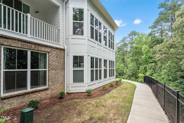 11548 Helmond Way # 104, Raleigh, NC 27617 - view of property exterior featuring brick siding