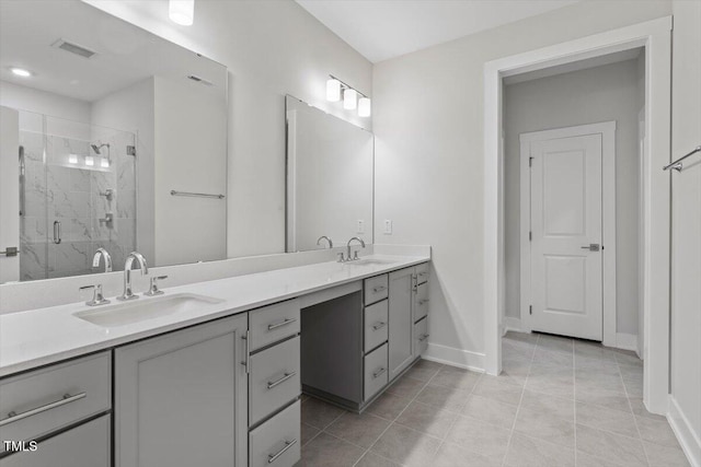 11548 Helmond Way # 104, Raleigh, NC 27617 - full bathroom featuring double vanity, a stall shower, tile patterned floors, and recessed lighting