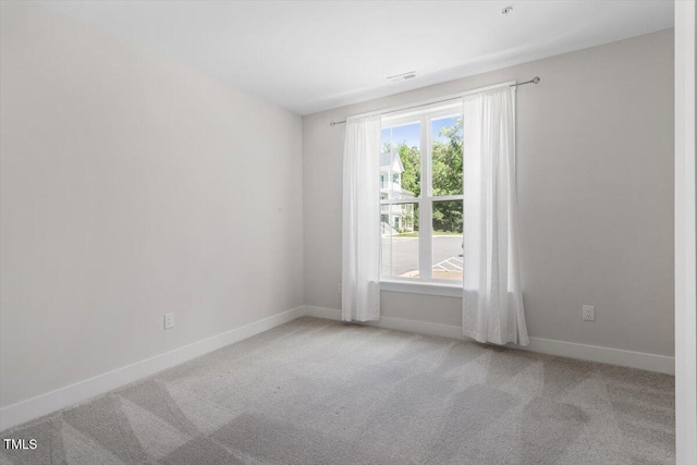 11548 Helmond Way # 104, Raleigh, NC 27617 - empty room featuring plenty of natural light and carpet floors