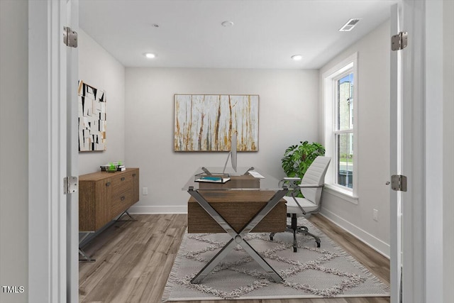 11548 Helmond Way # 104, Raleigh, NC 27617 - home office featuring light wood-style flooring and recessed lighting