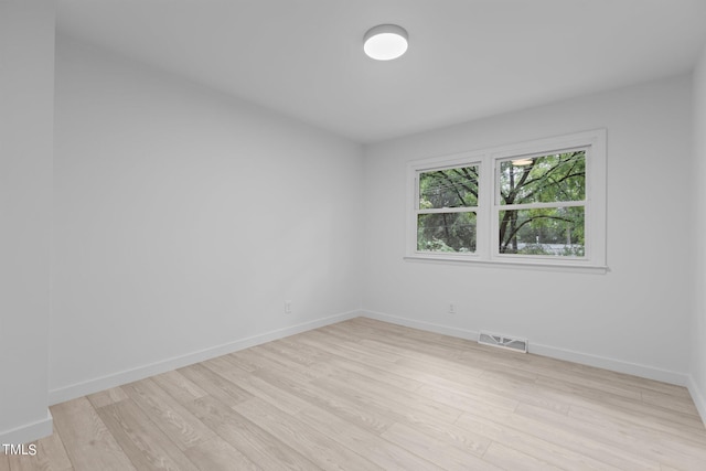 4812 Latimer Rd, Raleigh, NC 27609 - unfurnished room featuring light wood-style flooring and baseboards