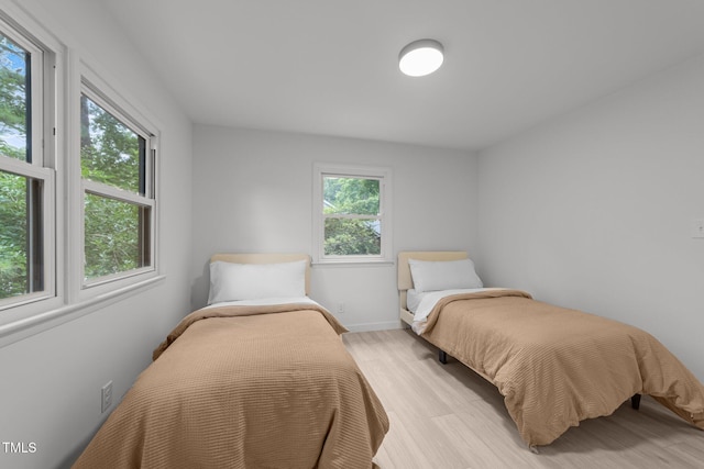 4812 Latimer Rd, Raleigh, NC 27609 - bedroom with light wood finished floors and baseboards