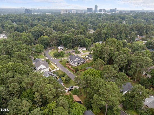 4812 Latimer Rd, Raleigh, NC 27609 - aerial view of property and surrounding area with a heavily wooded area