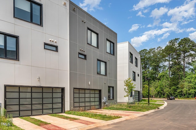 1106 Nova St, Durham, NC 27713 - view of building exterior with a garage