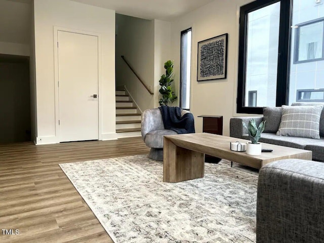 1106 Nova St, Durham, NC 27713 - living area featuring wood finished floors and stairway