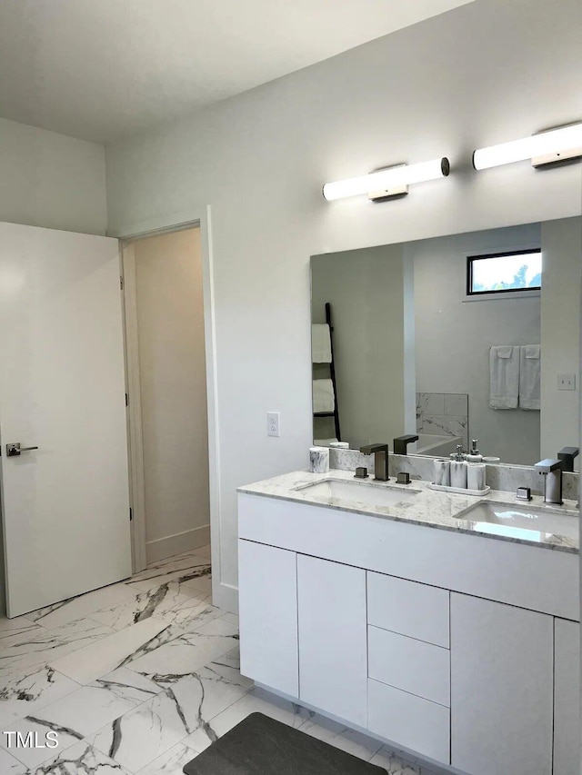 1106 Nova St, Durham, NC 27713 - bathroom featuring double vanity and marble finish floors