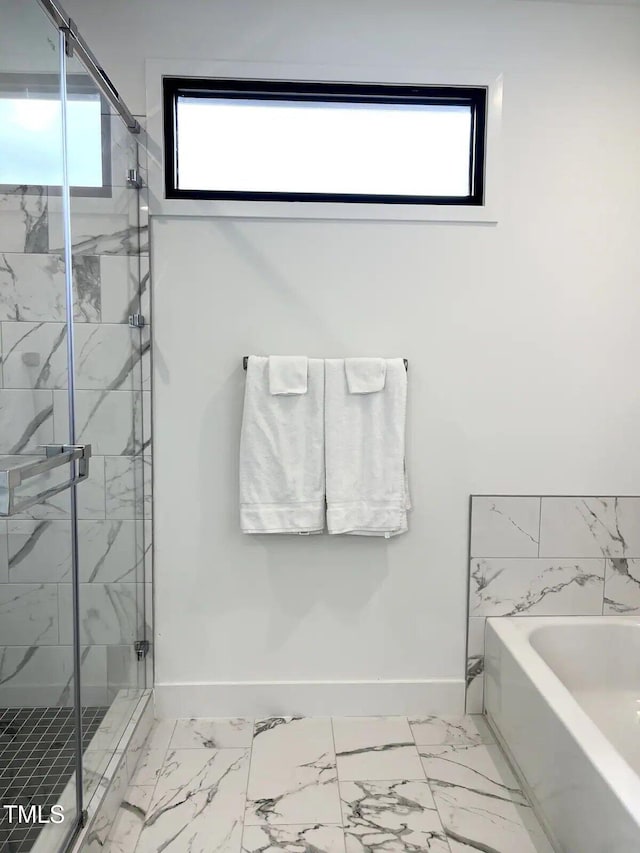 1106 Nova St, Durham, NC 27713 - full bath featuring marble finish floors, a garden tub, and healthy amount of natural light