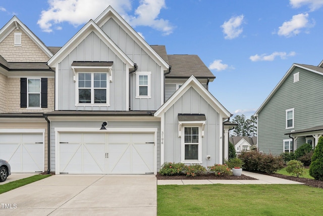 3194 Retama Run, New Hill, NC 27562 - view of front of house featuring board and batten siding, driveway, an attached garage, and a front yard