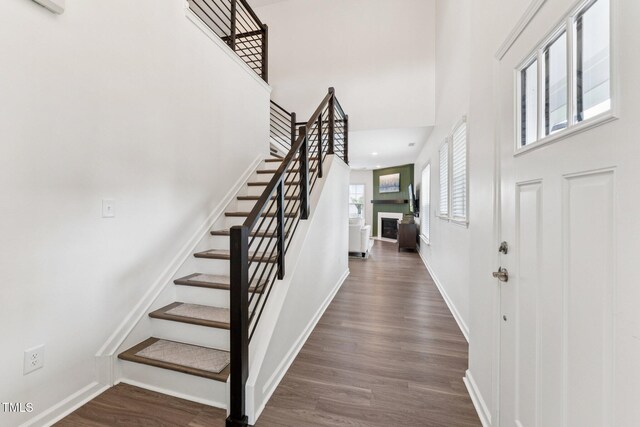 3194 Retama Run, New Hill, NC 27562 - entrance foyer featuring a high ceiling, stairs, wood finished floors, and recessed lighting