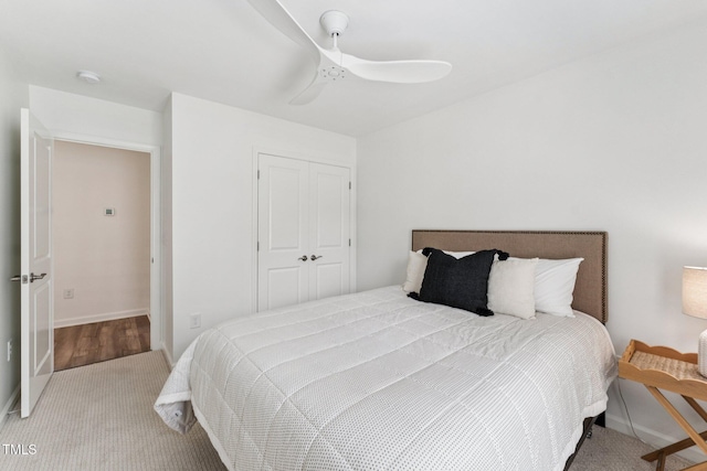 3194 Retama Run, New Hill, NC 27562 - bedroom featuring light carpet, ceiling fan, and a closet