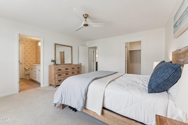 3194 Retama Run, New Hill, NC 27562 - bedroom with light colored carpet, connected bathroom, ceiling fan, and a closet