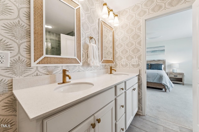 3194 Retama Run, New Hill, NC 27562 - bathroom with double vanity, wallpapered walls, and ensuite bathroom