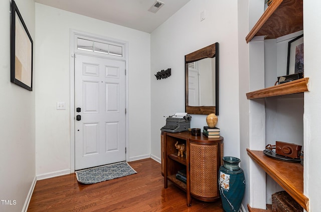 513 Dragby Ln, Raleigh, NC 27603 - foyer with wood finished floors and baseboards