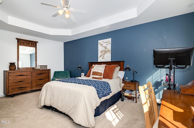 513 Dragby Ln, Raleigh, NC 27603 - bedroom featuring carpet, a raised ceiling, and a ceiling fan