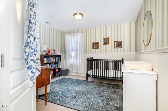 513 Dragby Ln, Raleigh, NC 27603 - carpeted bedroom with wallpapered walls and baseboards