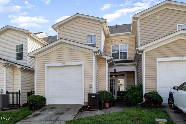 513 Dragby Ln, Raleigh, NC 27603 - townhome / multi-family property with a garage and driveway
