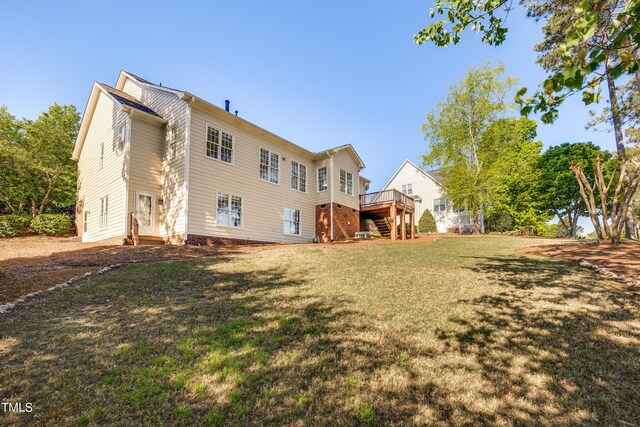 306 Neuse Ridge Dr, Clayton, NC 27527 - rear view of house featuring stairs, a deck, and a yard