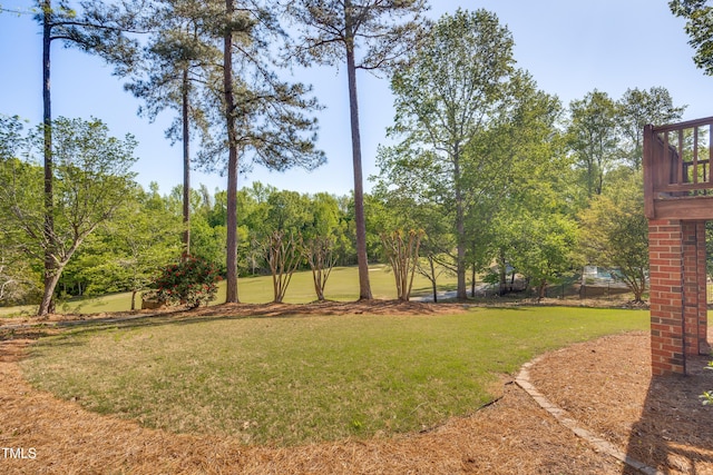306 Neuse Ridge Dr, Clayton, NC 27527 - view of green lawn with view of scattered trees