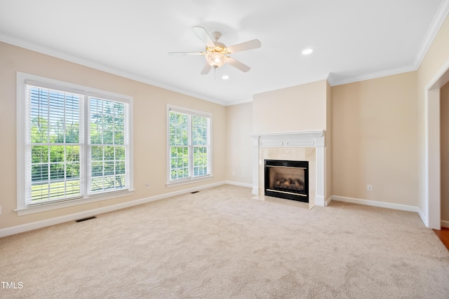 306 Neuse Ridge Dr, Clayton, NC 27527 - unfurnished living room with crown molding, a fireplace, ceiling fan, light colored carpet, and recessed lighting