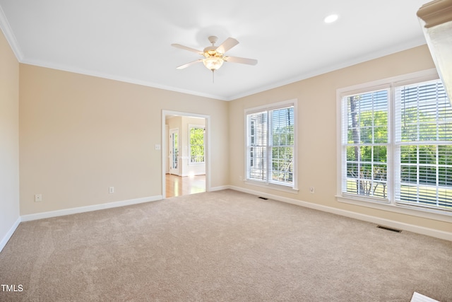 306 Neuse Ridge Dr, Clayton, NC 27527 - empty room featuring ornamental molding, carpet, and a ceiling fan