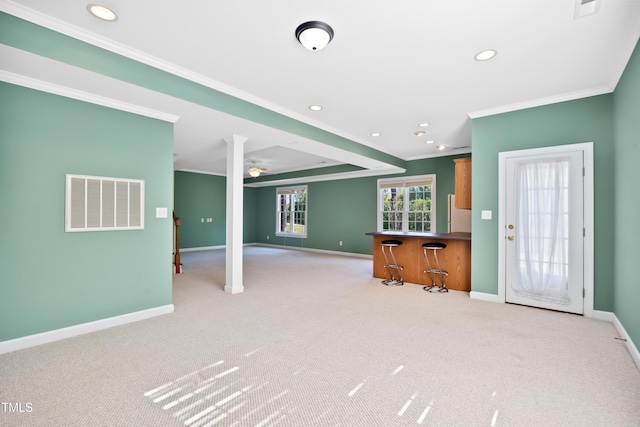 306 Neuse Ridge Dr, Clayton, NC 27527 - unfurnished living room with ornamental molding, carpet flooring, recessed lighting, a ceiling fan, and bar