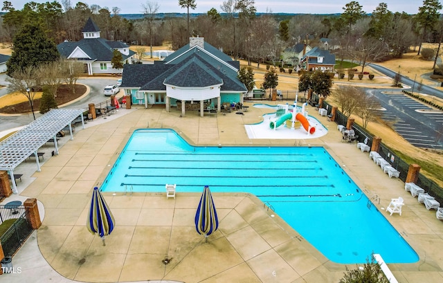 306 Neuse Ridge Dr, Clayton, NC 27527 - community pool featuring a patio