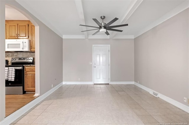 325 Hamilton St, Fayetteville, NC 28301 - unfurnished living room with a ceiling fan, beamed ceiling, and arched walkways