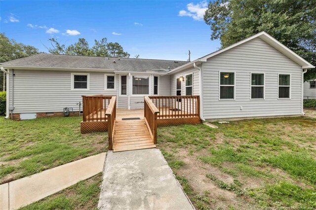 325 Hamilton St, Fayetteville, NC 28301 - rear view of property with a yard, a wooden deck, and crawl space
